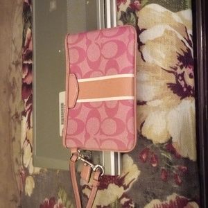 Coach Pink 🩷 and Orange 🧡 Chelsea Wristlet.